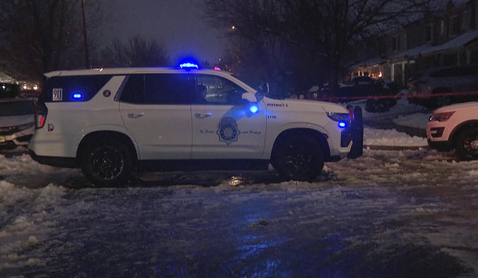 Police work on the scene of a shooting in Denver, Sunday, Feb. 4, 2024. (KMGH-TV via AP)