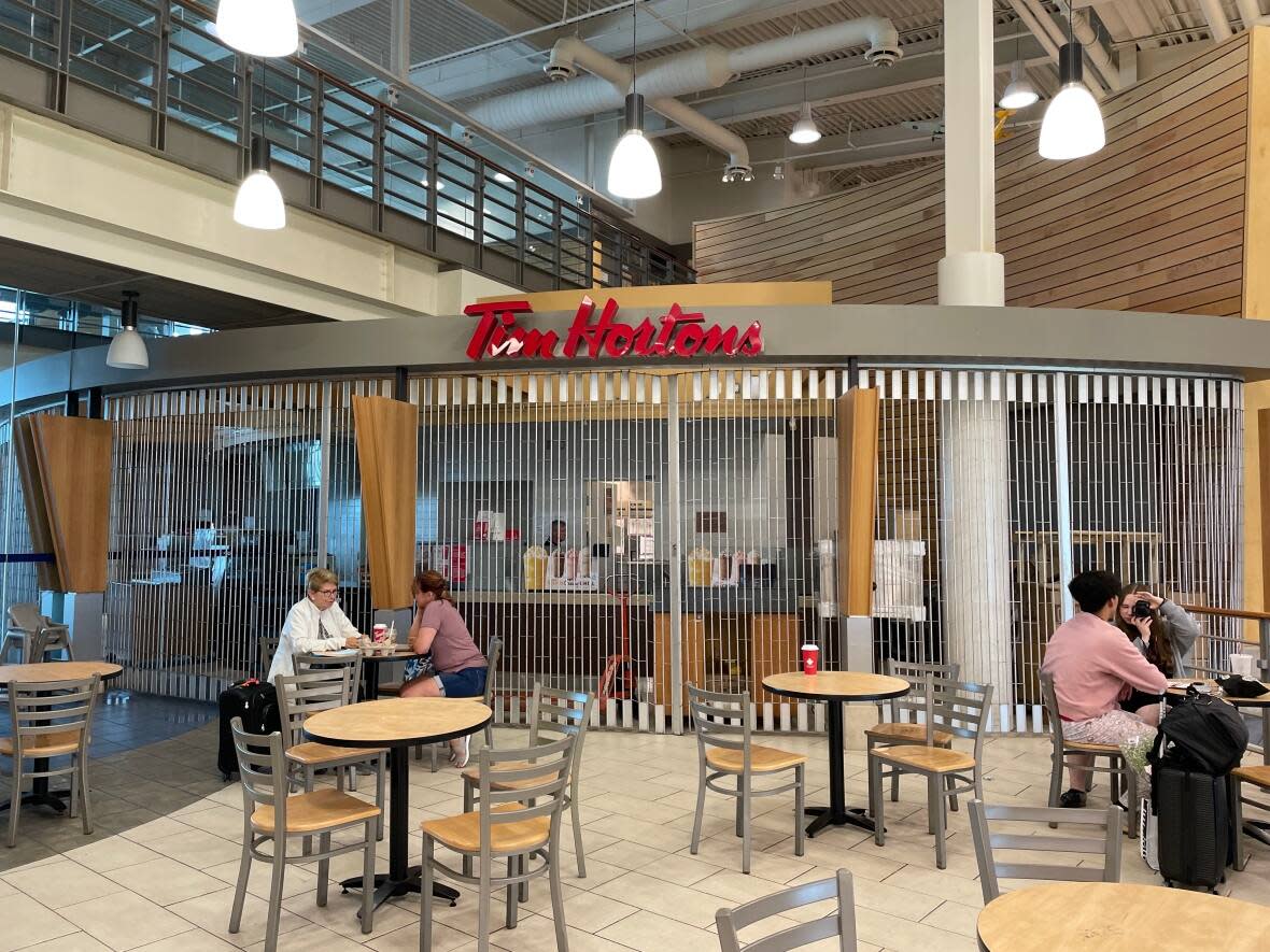 Until the Tim Hortons at the Greater Moncton Roméo LeBlanc International Airport reopens, the airport only has one restaurant available for travellers. (Alexandre Silberman/CBC - image credit)