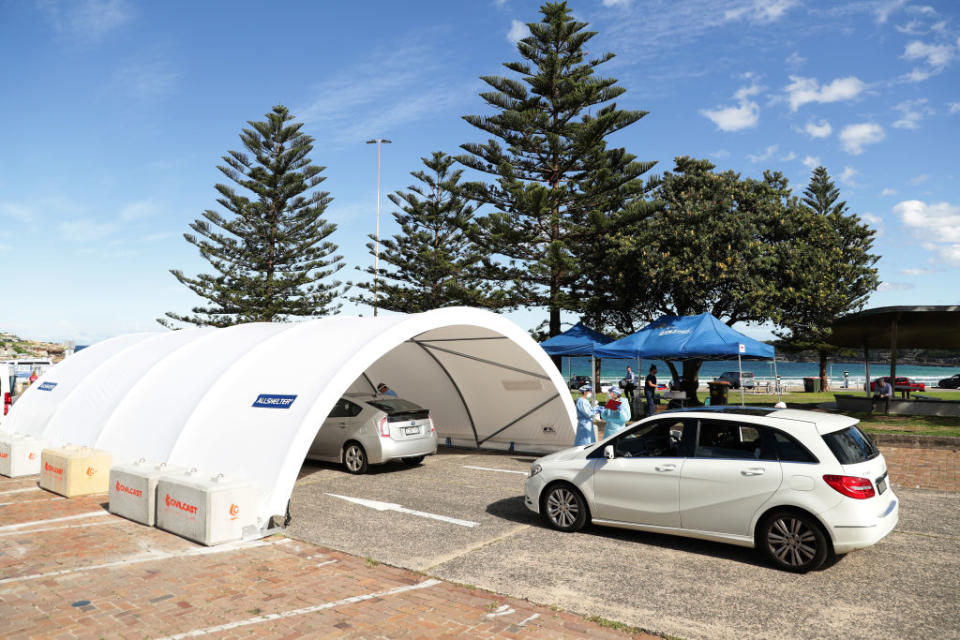 Medical professionals administer COVID-19 tests at the Bondi Beach drive-through COVID-19 testing centre. Source: Getty