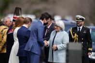 <p>Canada's Prime Minister Justin Trudeau is greeted by officials while awaiting the arrival of Prince Charles and his wife Camilla, Duchess of Cornwall, at the Confederation Building in St. John's, Newfoundland and Labrador on May 17, 2022. (Photo by Geoff Robins / AFP)</p> 