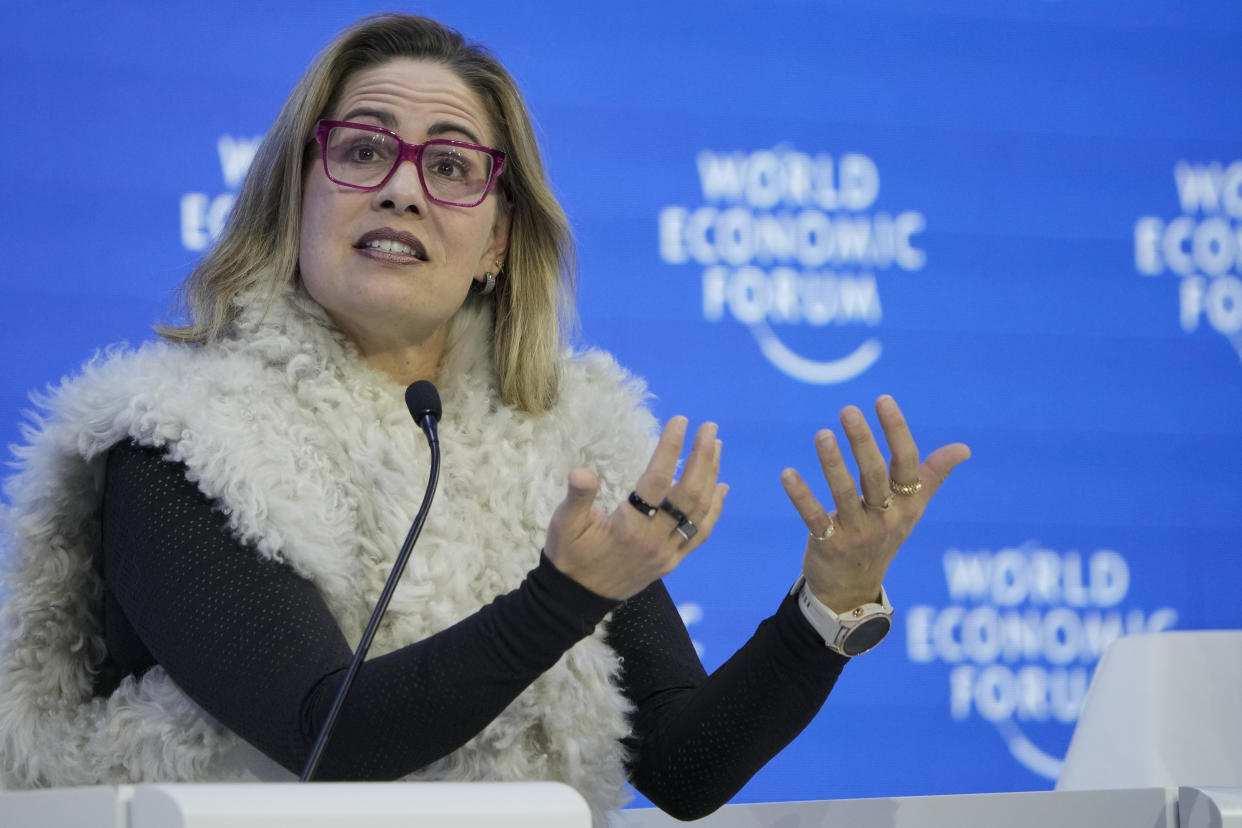 Sen. Kyrsten Sinema speaking on a panel at the World Economic Forum in Davos, Switzerland.