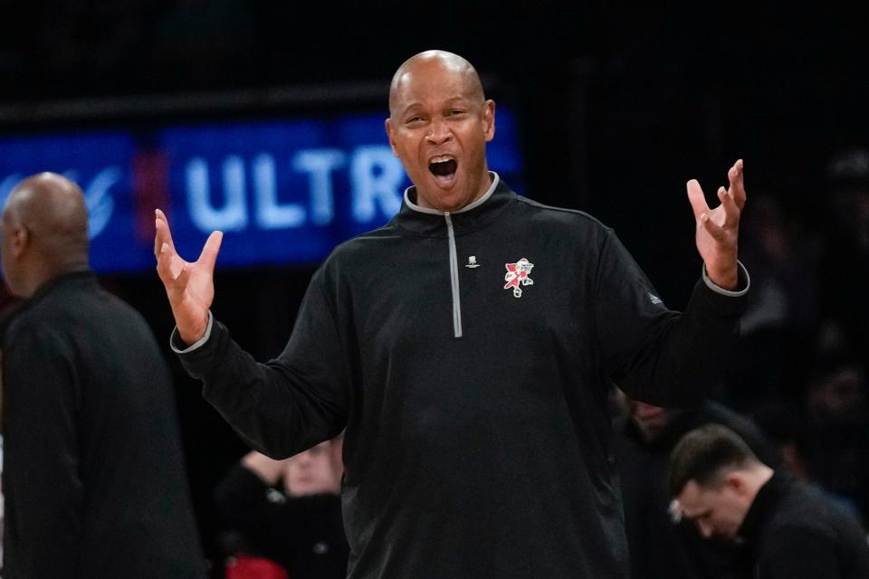 Louisville head coach Kenny Payne reacts during the second half of an NCAA college basketball game against Texas, Sunday, Nov. 19, 2023, in New York. (AP Photo/Seth Wenig)