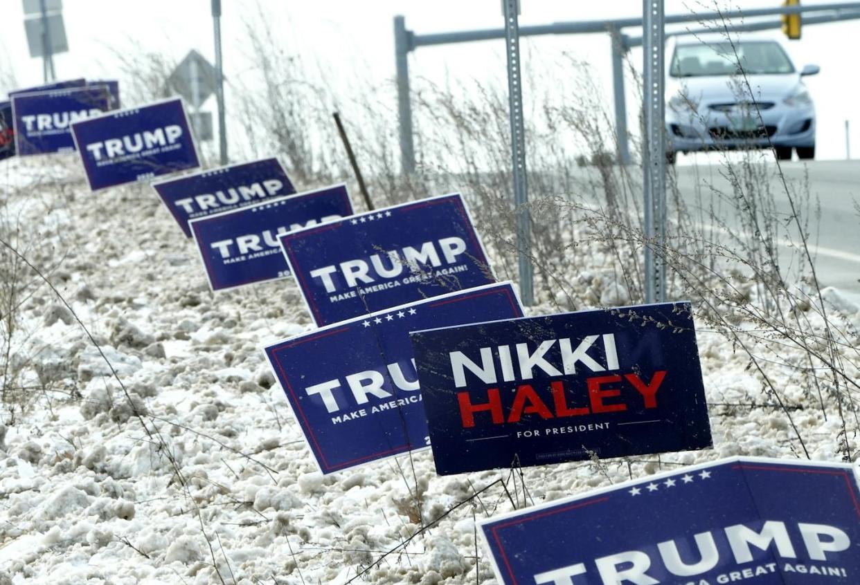 Campaign signs sit in the snow along a highway in Concord, N.H., on Jan. 18, 2024. <a href="https://www.gettyimages.com/detail/news-photo/campaign-signs-alongside-the-highway-in-concord-new-news-photo/1935914491?adppopup=true" rel="nofollow noopener" target="_blank" data-ylk="slk:Timothy A. Clary/AFP via Getty Images;elm:context_link;itc:0;sec:content-canvas" class="link ">Timothy A. Clary/AFP via Getty Images </a>