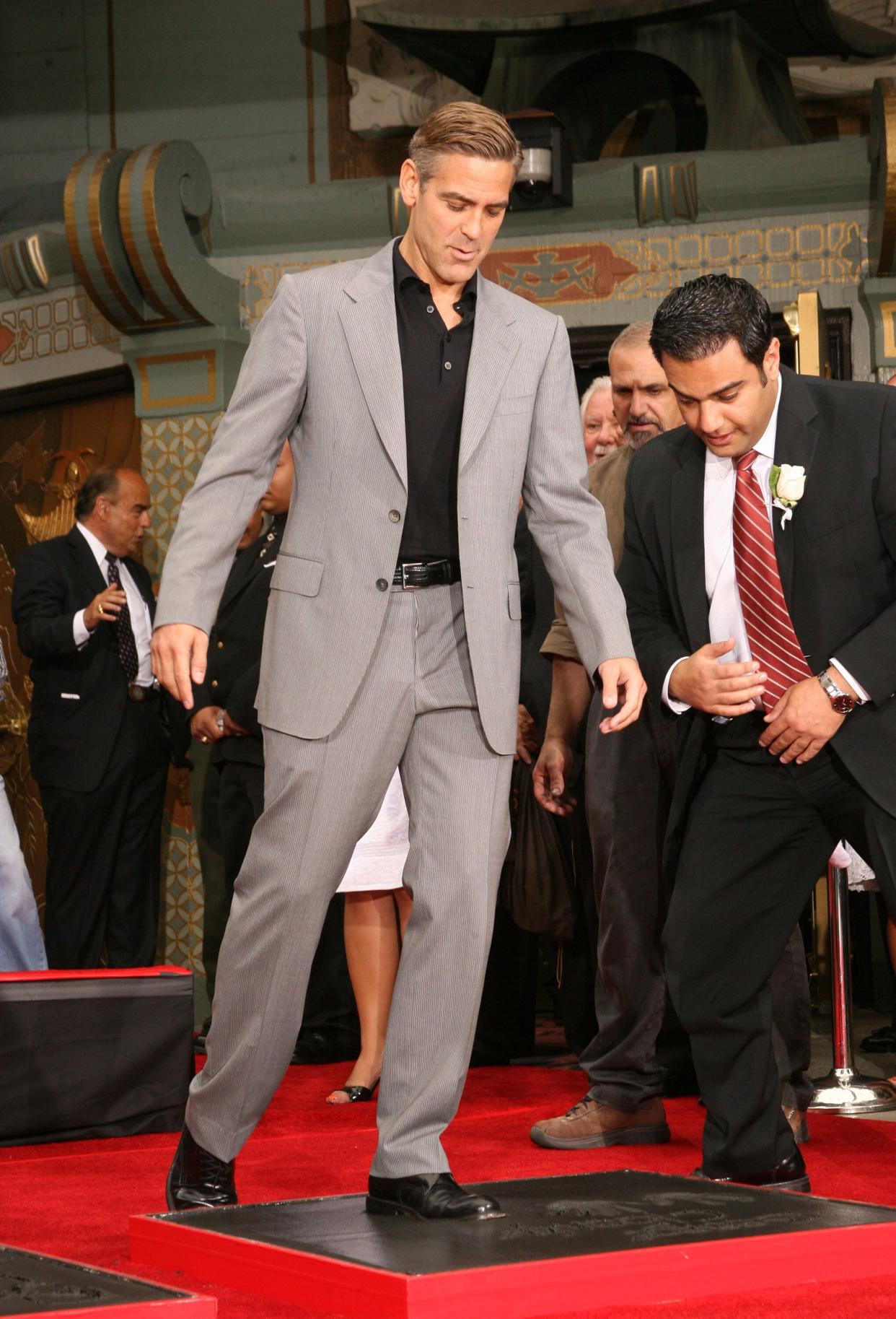 Clooney at the "Ocean's Thirteen" handprint and footprint ceremony at Grauman's Chinese Theatre in Hollywood.