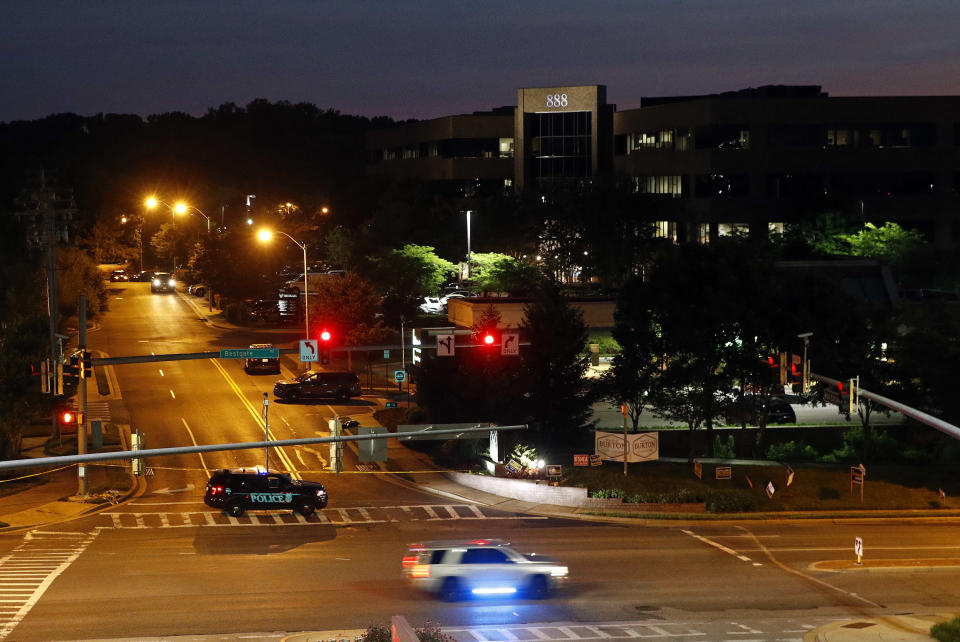 <p>An emergency vehicle blocks a road leading to the scene of a shooting at The Capital Gazette newspaper’s offices at dawn, Friday, June 29, 2018, in Annapolis, Md. (Photo: Patrick Semansky/AP) </p>