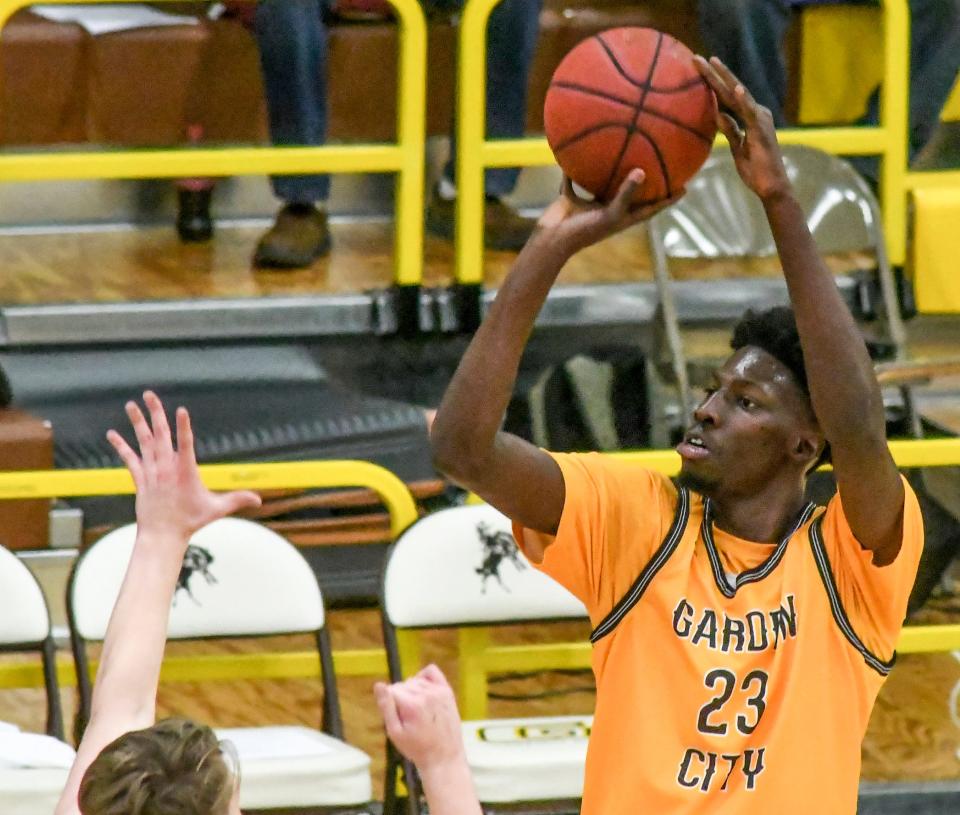 Garden City Community College's Mohamed Diarra goes up for a basket.