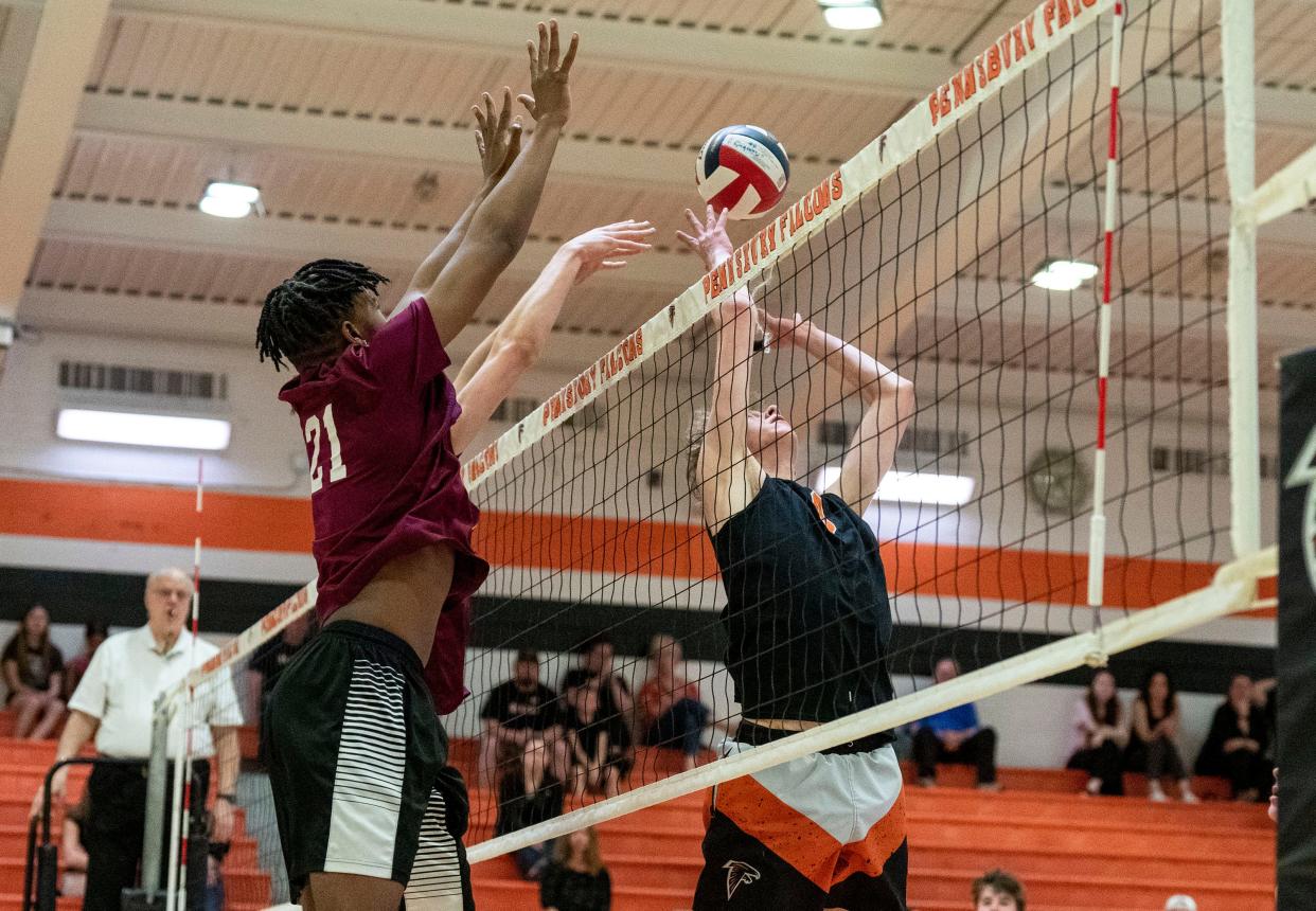 Abington's Keyshawn Pinkney (21) against Pennsbury's Kieran Shaw (9) during their boys' volleyball match in Fairless Hills on Tuesday, April 23, 2024.