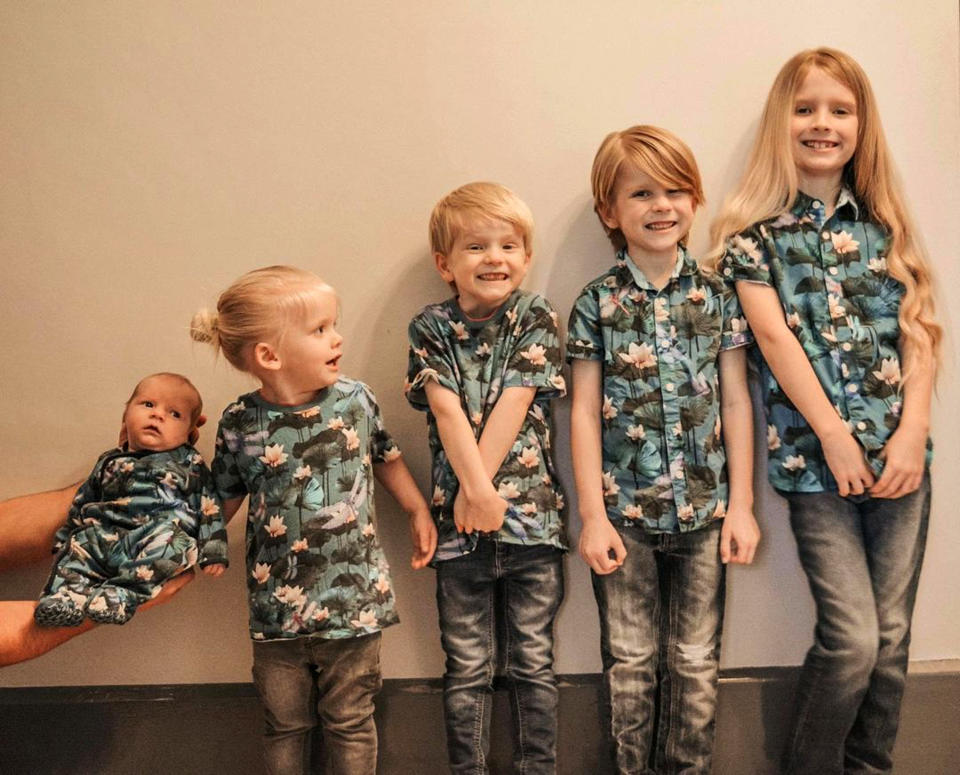 A mum has defended her sons' right to leave their hair long, pictured (L-R) Leif, Bodhi, Cole, Noah, and Jaxon. (Caters)