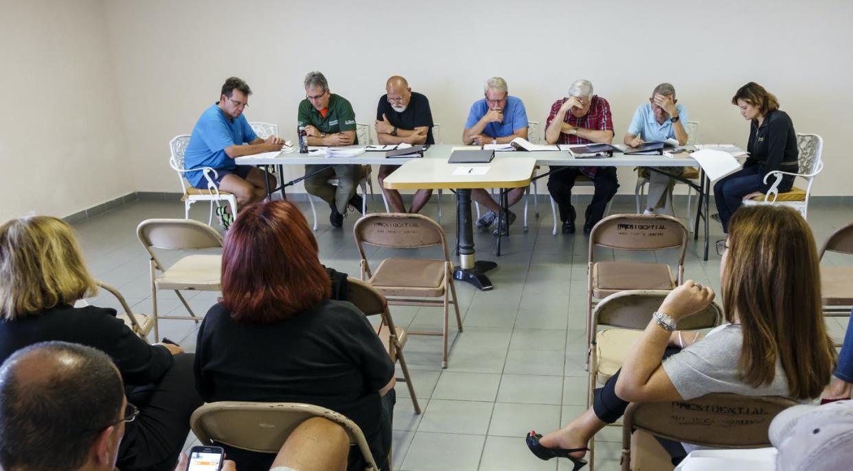 <span class="caption">Condo association boards make decisions with long-term consequences for their communities.</span> <span class="attribution"><a class="link " href="https://www.gettyimages.com/detail/news-photo/presidential-condominiums-meeting-room-news-photo/916117904" rel="nofollow noopener" target="_blank" data-ylk="slk:Jeffrey Greenberg/Universal Images Group via Getty Images;elm:context_link;itc:0;sec:content-canvas">Jeffrey Greenberg/Universal Images Group via Getty Images</a></span>