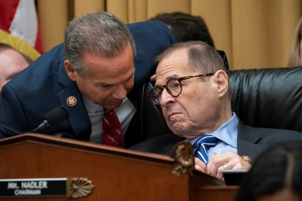 House Judiciary Committee Chairman Jerry Nadler, D-N.Y., right, confers with Rep. David Cicilline, D-R.I., left, as the panel approves procedures for impeachment investigation hearings on President Donald Trump on Sept. 12.