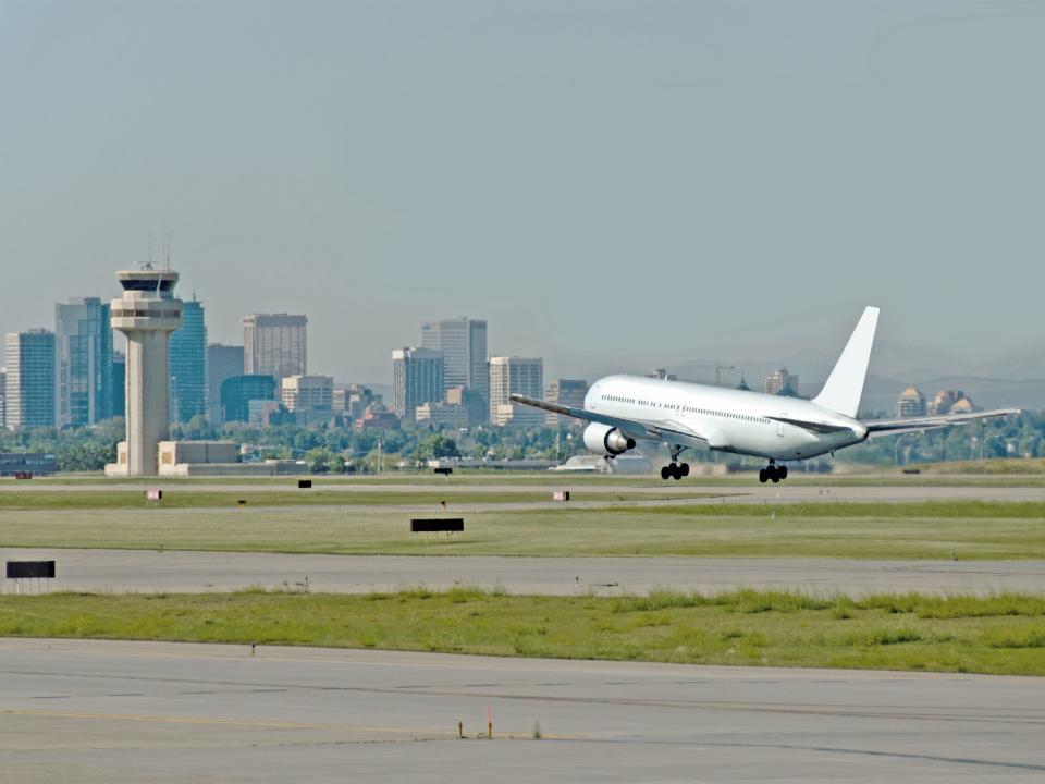 A passenger plane landing at Calgary International Airport.