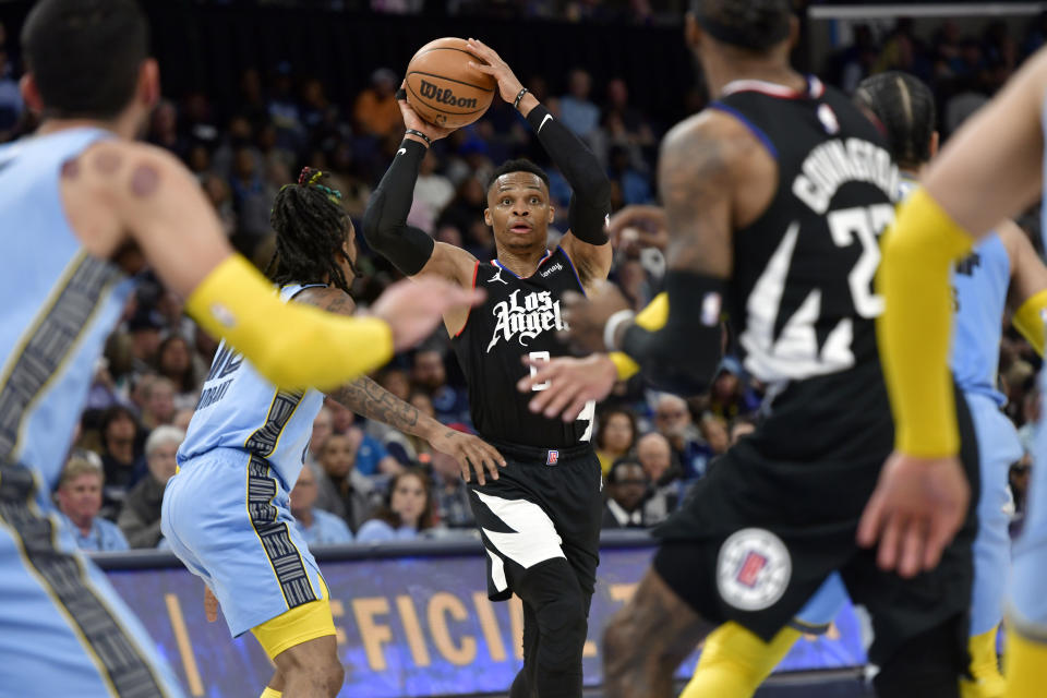 Los Angeles Clippers guard Russell Westbrook (0) looks to pass against the Memphis Grizzlies in the second half of an NBA basketball game Wednesday, March 29, 2023, in Memphis, Tenn. (AP Photo/Brandon Dill)