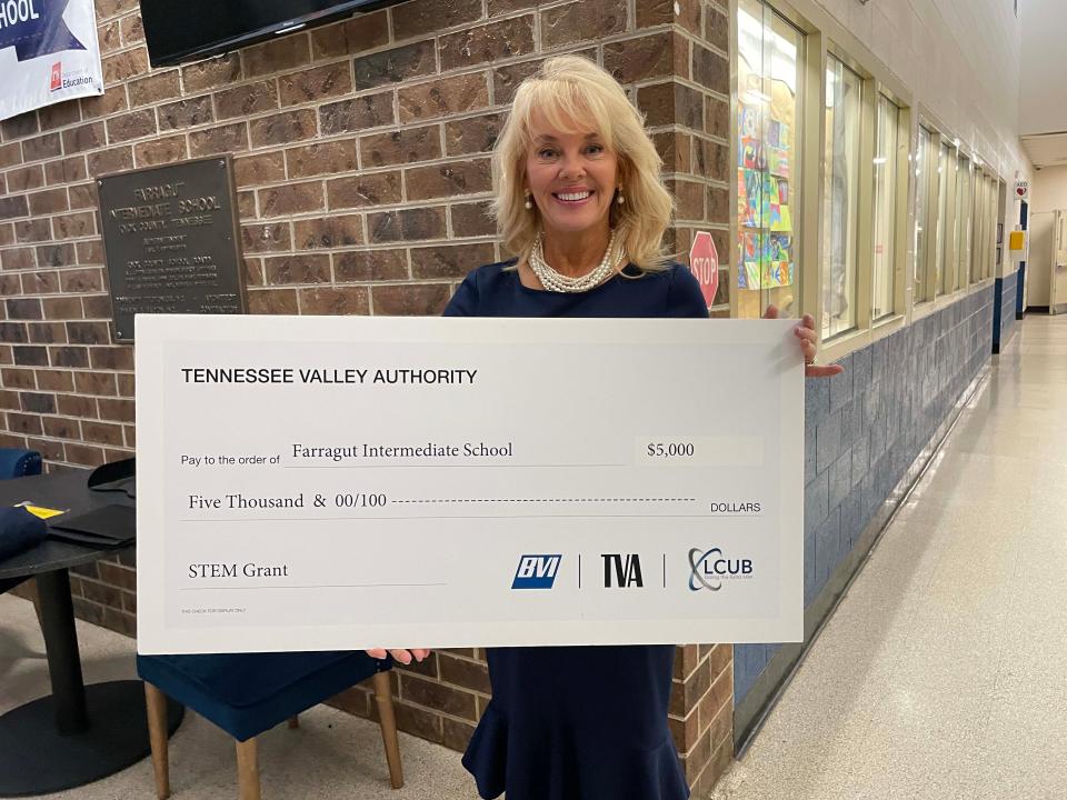 Principal Suzanne Parham is thrilled to receive a $5,000 check from BVI, TVA, and LCUB for STEM projects at Farragut Intermediate School, May 9, 2024.
