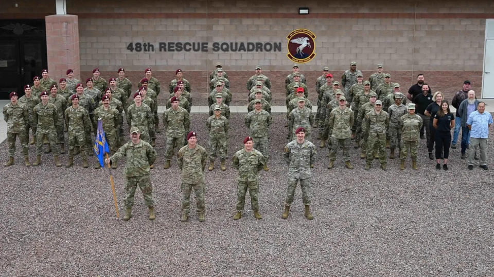 Airmen from the 48th Rescue Squadron pose for a photo at Davis-Monthan Air Force Base, Ariz., March 15. The 48th RQS is composed of pararescuemen, combat rescue officers and support personnel that execute rescue missions nationally and internationally in support of combat and humanitarian operations. (Airman William Finn/Air Force)