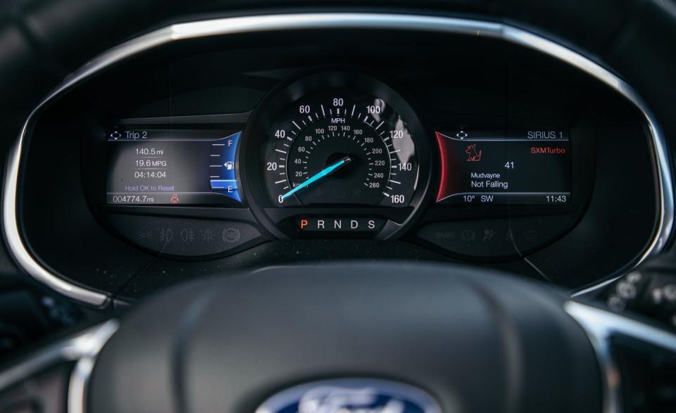 <p>The Edge's instrumentation is also showing its age, with a central analog speedometer set between two small, difficult-to-read digital displays, one of which can be configured to show a tiny tachometer that we often had to squint to decipher.</p>