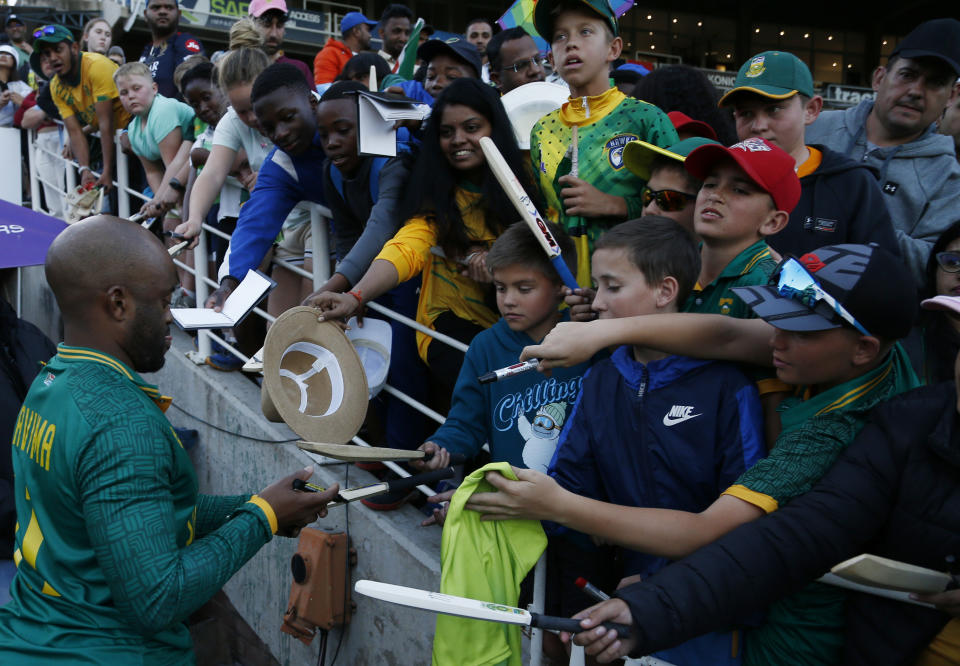 South Africa's Temba Bavuma signs autographs after winning their 3-2 series against Australia at the Wanderers Stadium in Johannesburg, South Africa, Sunday, Sept. 17, 2023. (AP Photo)