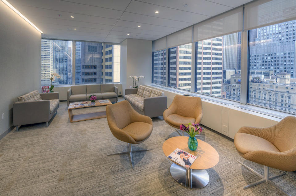 In this undated photo provided by CCRM New York, sunlight streams in to a serene, calming waiting space overlooking midtown New York's bustling cityscape, at the Colorado Center for Reproductive Medicine's New York offices. (CCRM New York via AP)