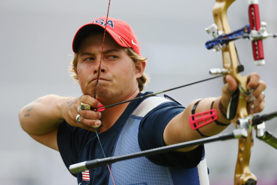 LONDON, ENGLAND - JULY 28: Brady Ellison of the United States looks on as he competes during the Men's Team Archery Final between the United States and Italy on Day 1 of the London 2012 Olympic Games at Lord's Cricket Ground on July 28, 2012 in London, England. (Photo by Paul Gilham/Getty Images)