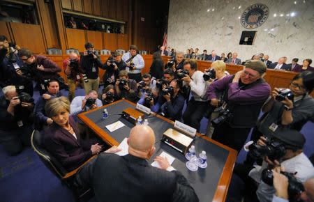 Former Director of National Intelligence James Clapper (C-Bottom) and former Deputy Attorney General Sally Yates (L) arrive to testify before a Senate Judiciary Committee hearing on “Russian interference in the 2016 U.S. election” on Capitol Hill in Washington, U .S., May 8, 2017. REUTERS/Jim Bourg