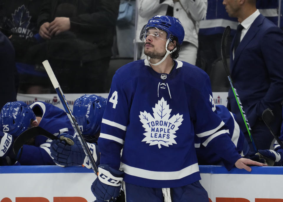 Toronto Maple Leafs center Auston Matthews (34) reacts after Game 7 in an NHL hockey first-round playoff series against the Tampa Bay Lightning in Toronto, Saturday, May 14, 2022. (Frank Gunn/The Canadian Press via AP)