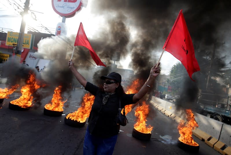 A demonstrator takes part in a protest against the government of president Juan Orlando Hernandez in Tegucigalpa