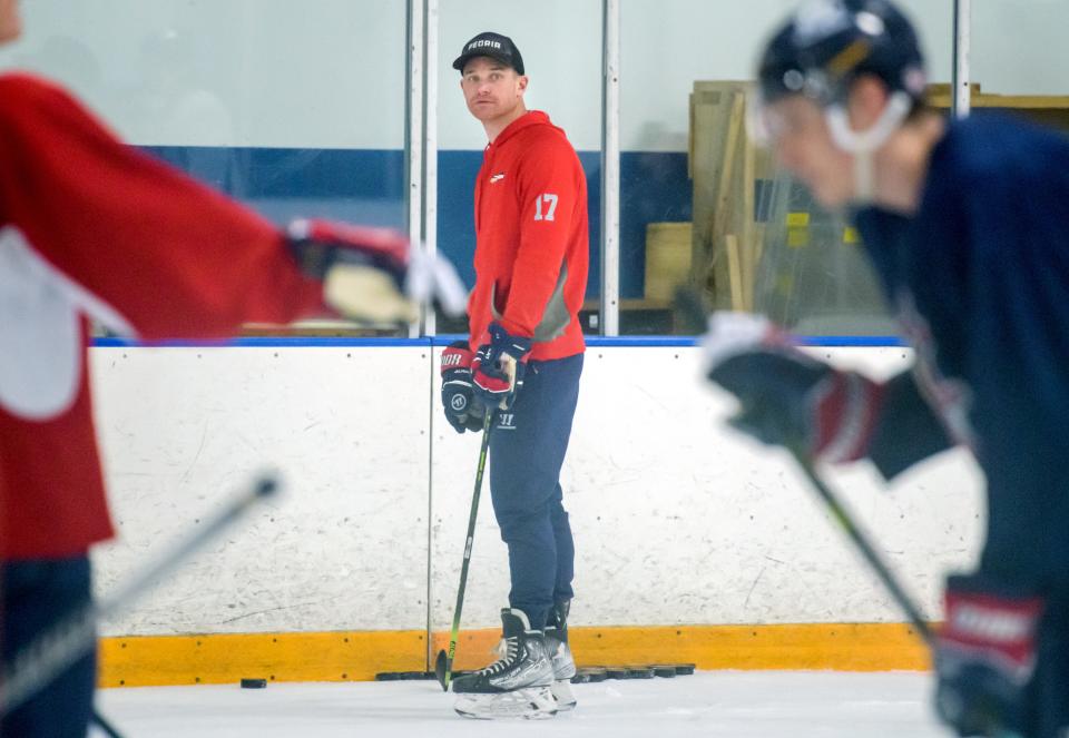 Peoria Rivermen associate head coach Alec Hagaman runs a drill during training camp Tuesday, Oct. 10, 2023 at Owens Center. The former Rivermen captain retired after last season and came onboard in a coaching position for the Rivermen.