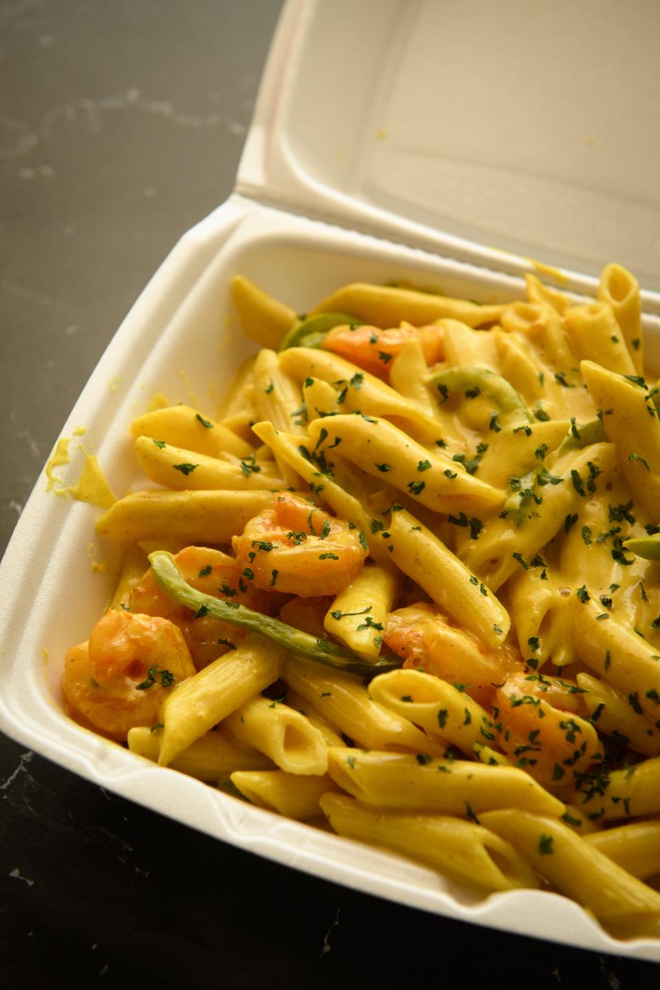 Curry shrimp pasta from A&M Island Cafe in Midway Center on Bragg Boulevard.