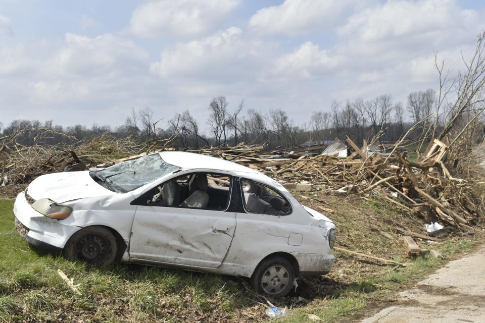 Calvin Bowman's Toyota Echo was battered and moved during a tornado March 31 in Owen County.