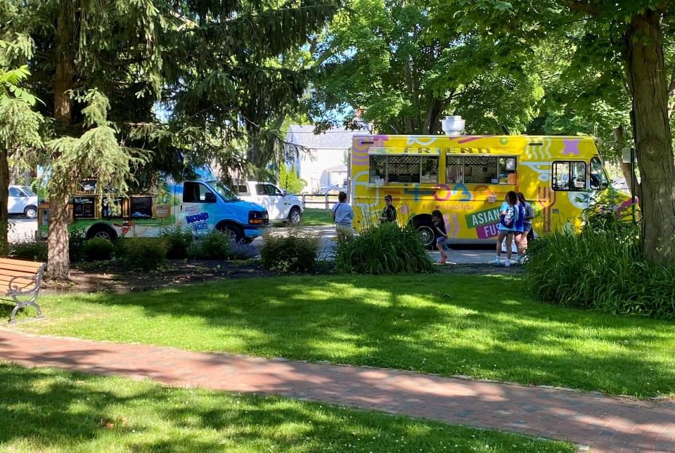 Kona Ice and Friends 4 Oba food trucks set up in the town's new mobile vending area for Tune & Fork Tuesday.