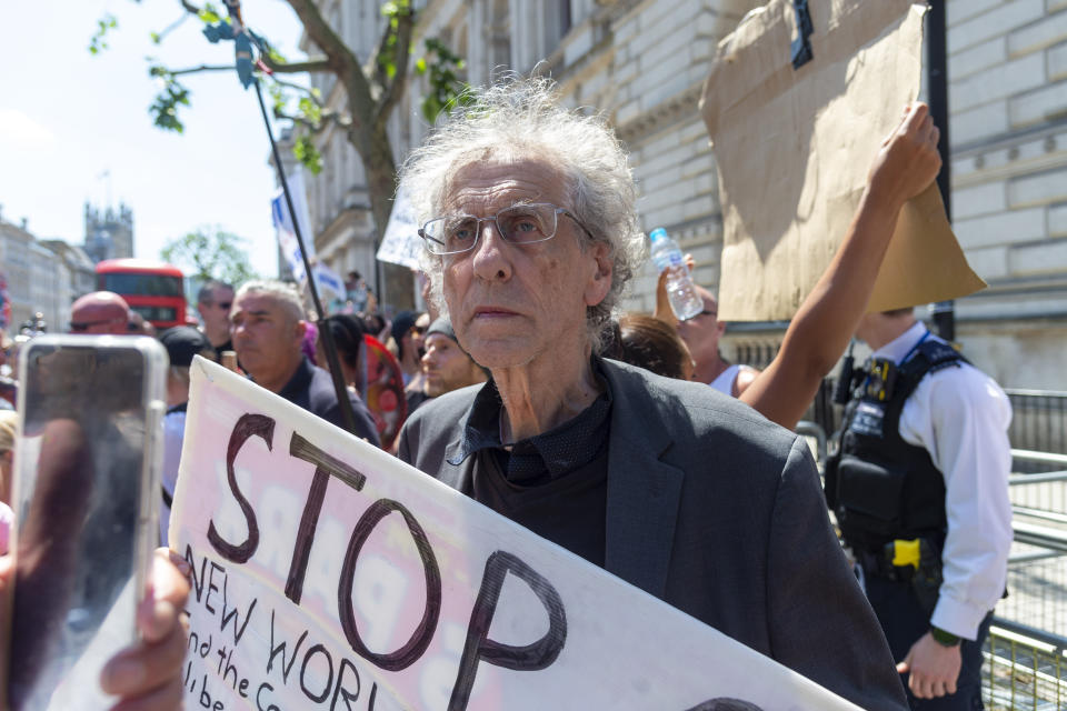 Piers Corbyn holds a placard outside the Houses of Parliament during the �We are the resistance� anti lockdown protest in London as Prime Minister makes a statement regarding extending existing lockdown restrictions that were due to be lifted on June 21st due to a spike in Covid-19 cases. (Photo by Dave Rushen / SOPA Images/Sipa USA)