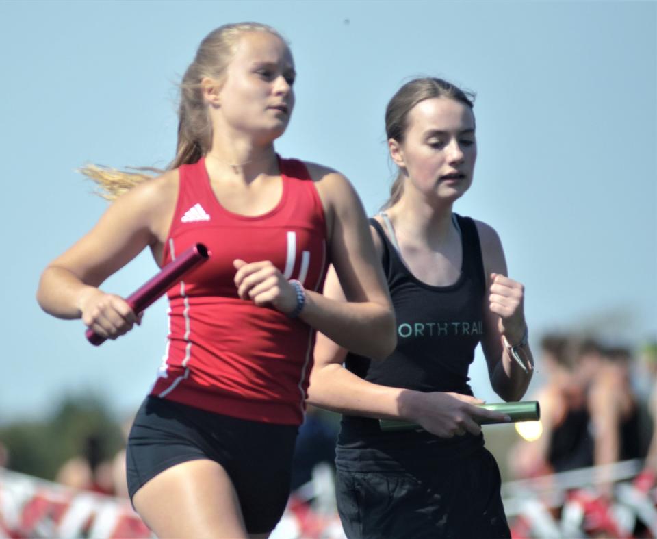 Allie Nowak passes a runner in the 4x800 meter relay during the Johannesburg-Lewiston Invite on Tuesday, May 9.