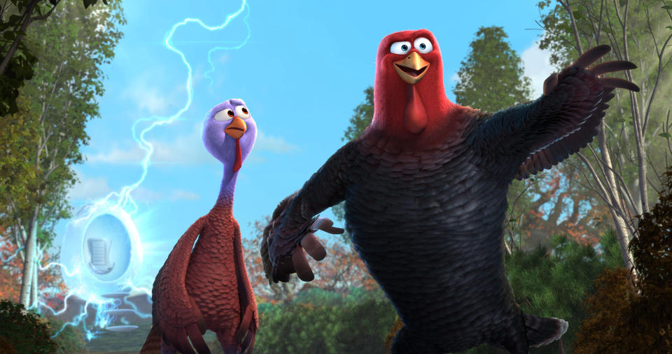 This image released by Relativity Media shows Reggie, voiced by Owen Wilson, left, and Jake, voiced by Woody Harrelson, in a scene from the animated film "Free Birds." (AP Photo/Relativity Media)