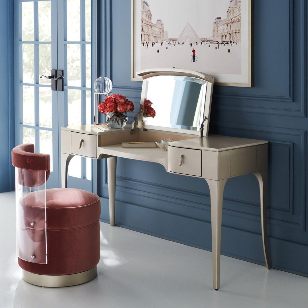 <p><a href="https://www.kathykuohome.com/Product/Detail/122054-Caracole-Kiss-N-Makeup-French-Country-Soft-Silver-Hardwood-Drawer-Vanity-Desk" rel="nofollow noopener" target="_blank" data-ylk="slk:Shop Now;elm:context_link;itc:0;sec:content-canvas" class="link rapid-noclick-resp">Shop Now</a></p><p>Kiss N Makeup Vanity Desk</p><p>Kathy Kuo Home</p><p>$1860.00</p><span class="copyright">Kathy Kuo Home</span>
