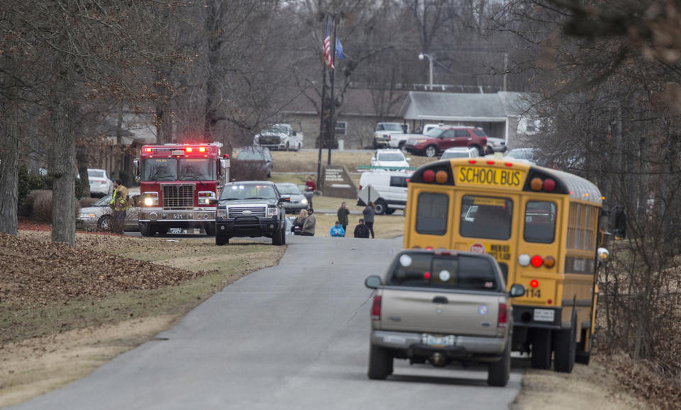 <p>Emergency crews respond to Marshall County High School after a fatal school shooting on Jan. 23, 2018, in Benton, Ky. (Photo: Ryan Hermens/The Paducah Sun via AP) </p>