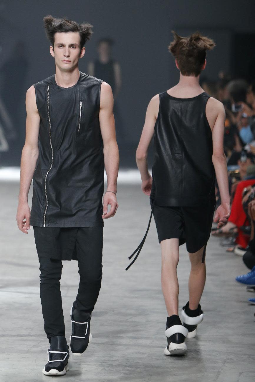 Models wear creations by fashion designer Rick Owens as part of his men's fashion Spring-Summer 2014 collection, presented Thursday, June 27, 2013 in Paris. (AP Photo/Francois Mori)