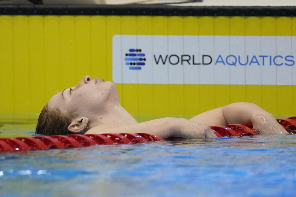 Mollie O'Callaghan of Australia reacts after winning the women's 100m freestyle final at the World Swimming Championships in Fukuoka, Japan, Friday, July 28, 2023. (AP Photo/Lee Jin-man)