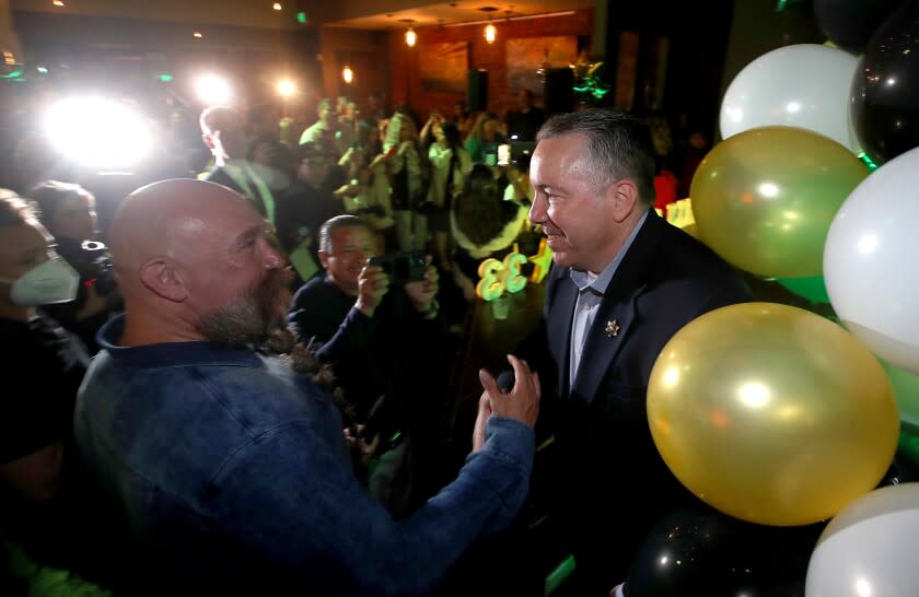 LOS ANGELES, CALIF. - JUNE 7, 2022. Los Angeles County Sheriff Alex Villanueva meets with supportersafter speaking at an election night gathering in Boyle Heights on Tuesday, June 7, 2022. (Luis Sinco / Los Angeles Times)