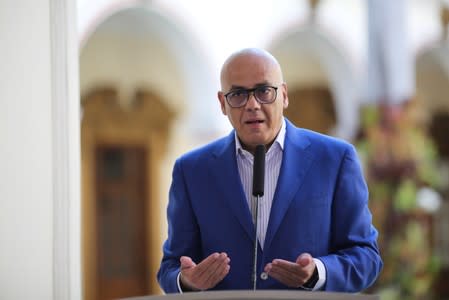 FILE PHOTO: Venezuela's Communications and Information Minister Jorge Rodriguez speaks during a broadcast at the Miraflores Palace in Caracas