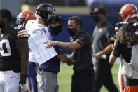 Baltimore Ravens head coach John Harbaugh, left, and Cleveland Browns head coach Kevin Stefanski, greet each other at the end of an NFL football game, Sunday, Sept. 13, 2020, in Baltimore. Ravens defeated the Browns 38-6. (AP Photo/Nick Wass)