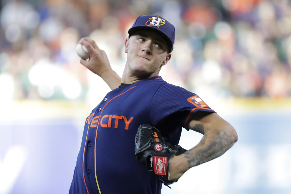 Houston Astros starting pitcher Hunter Brown throws against the Texas Rangers during the first inning of a baseball game, Monday, Sept. 5, 2022, in Houston. (AP Photo/Michael Wyke)