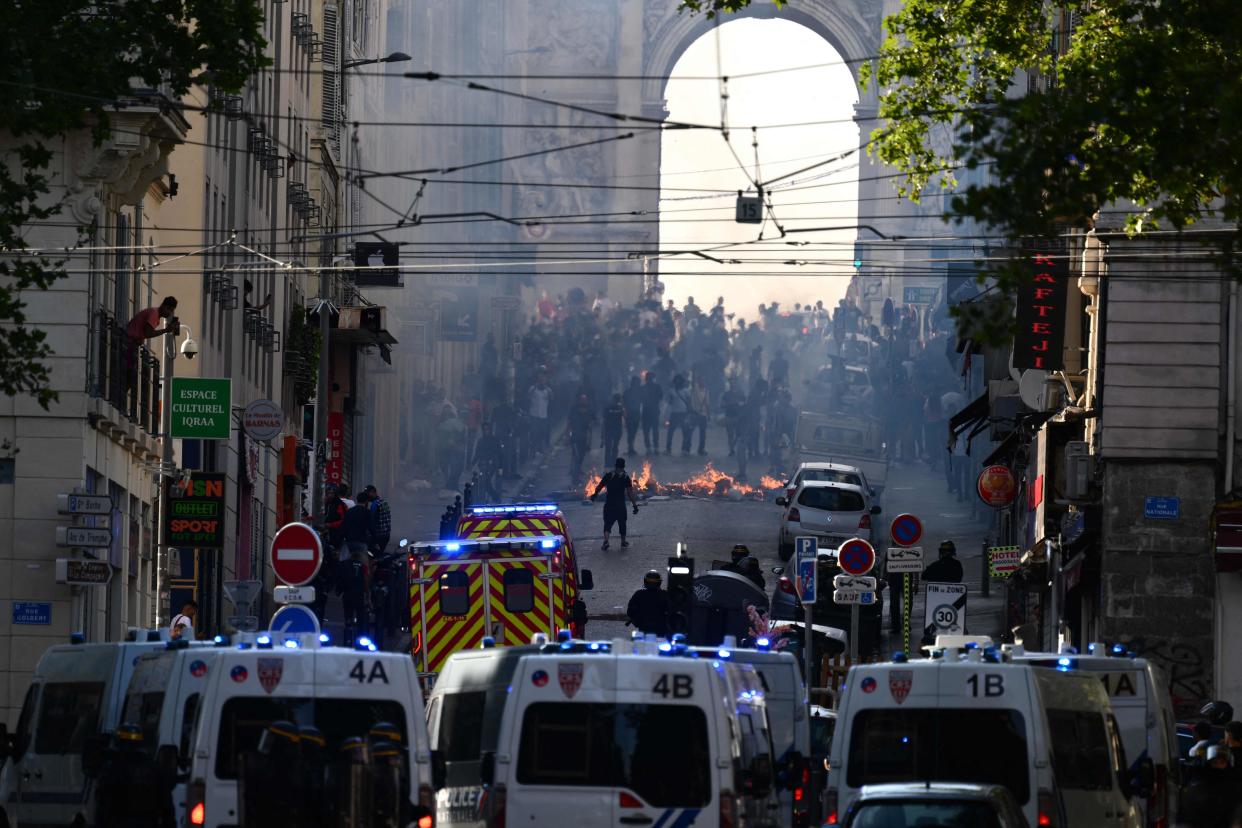 Protesters clash with CRS riot police at the Porte d'Aix in Marseille, southern France on 30 June 2023 (AFP via Getty Images)