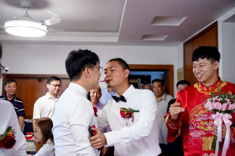 The Wider Image: Coronavirus dampens celebrations in China's wedding gown city