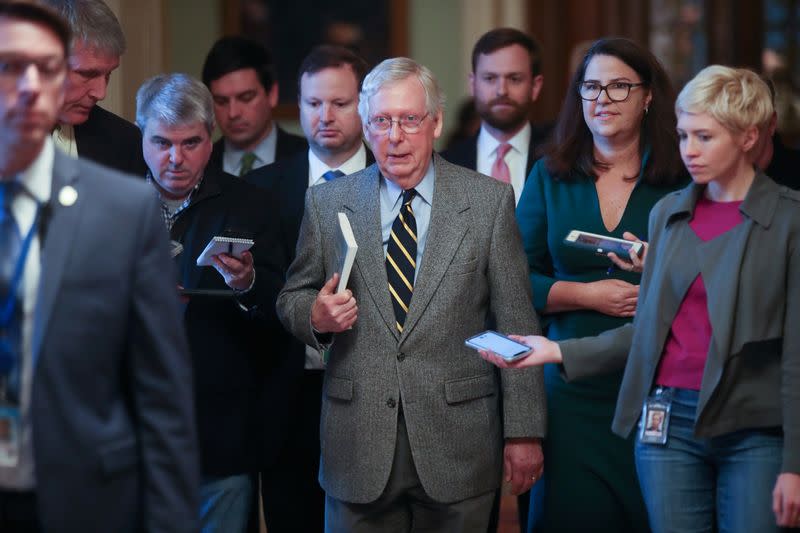 U.S. Senate Majority Leader McConnell speaks to reporters as he departs the Senate floor in the U.S. Capitol in Washington