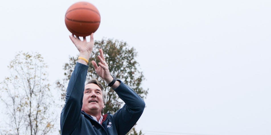 Virginia Republican gubernatorial candidate Glenn Youngkin plays basketball near a voting location in the Rocky Run Middle School on November 02, 2021 in Chantilly, Virginia. Virginia's gubernatorial race pits Youngkin against Democratic gubernatorial candidate, former Virginia Gov. Terry McAuliffe.