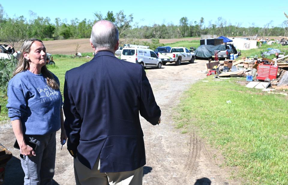 Lynn Burns showed Congressman Tim Walberg Friday where her home once stood off Arney Road in Sherwood Township.