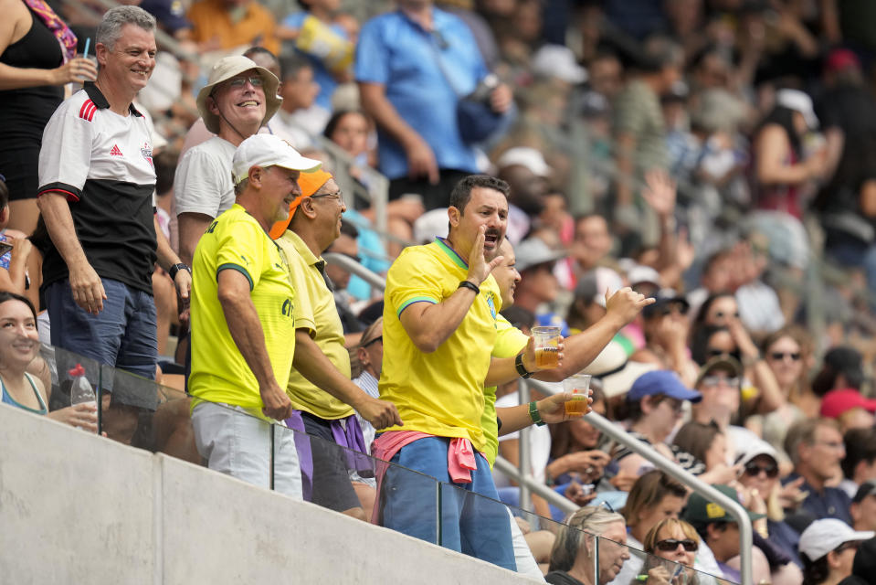 Tennis fans react during a first round match between Sloane Stephens, of the United States, and Beatriz Haddad Maia, of Brazil, at the U.S. Open tennis championships, Monday, Aug. 28, 2023, in New York. (AP Photo/Charles Krupa)