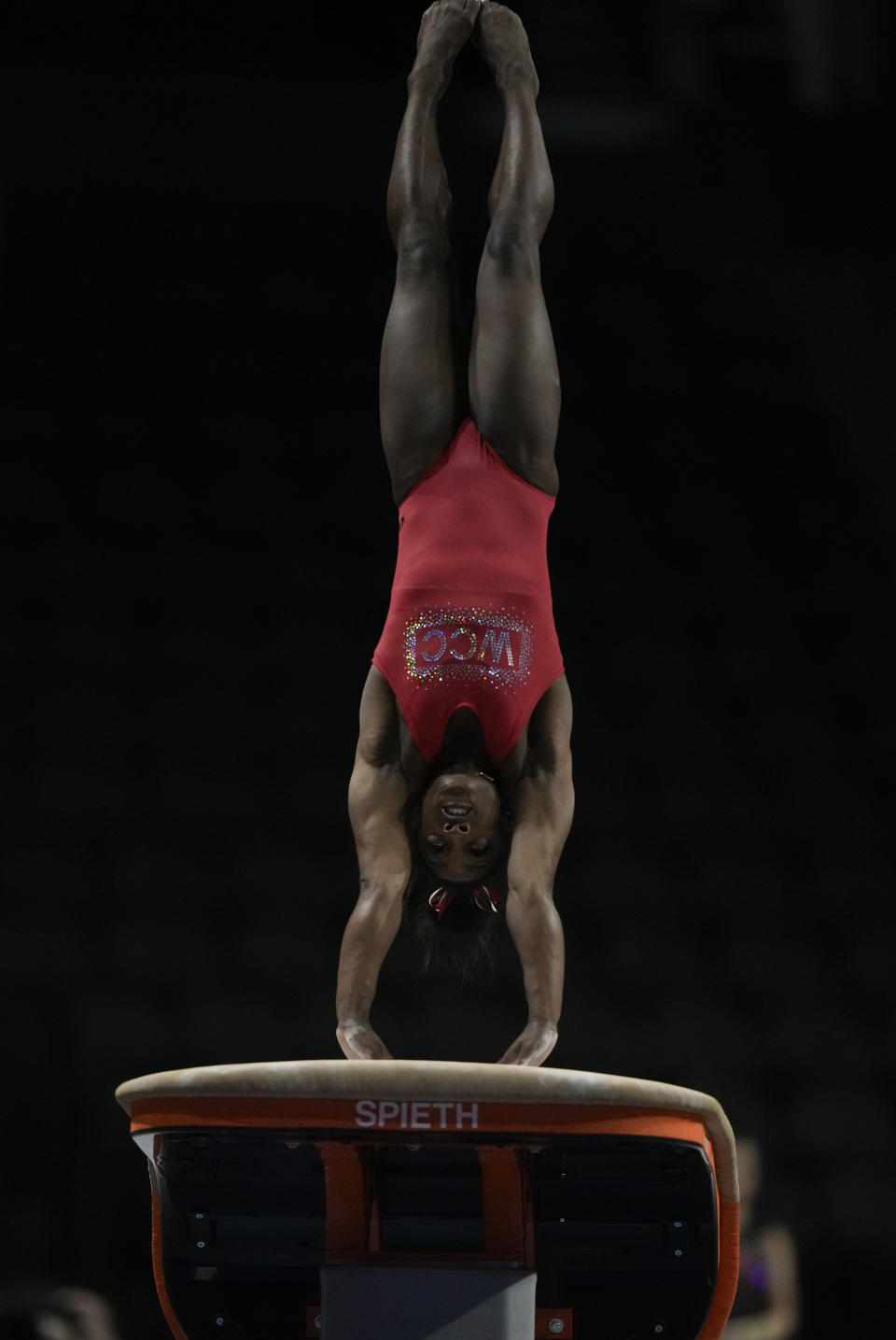 Simone Biles, a seven-time Olympic medalist and the 2016 Olympic champion, practices on the vault at the U.S. Classic gymnastics competition Friday, Aug. 4, 2023, in Hoffman Estates, Ill. (AP Photo/Morry Gash)