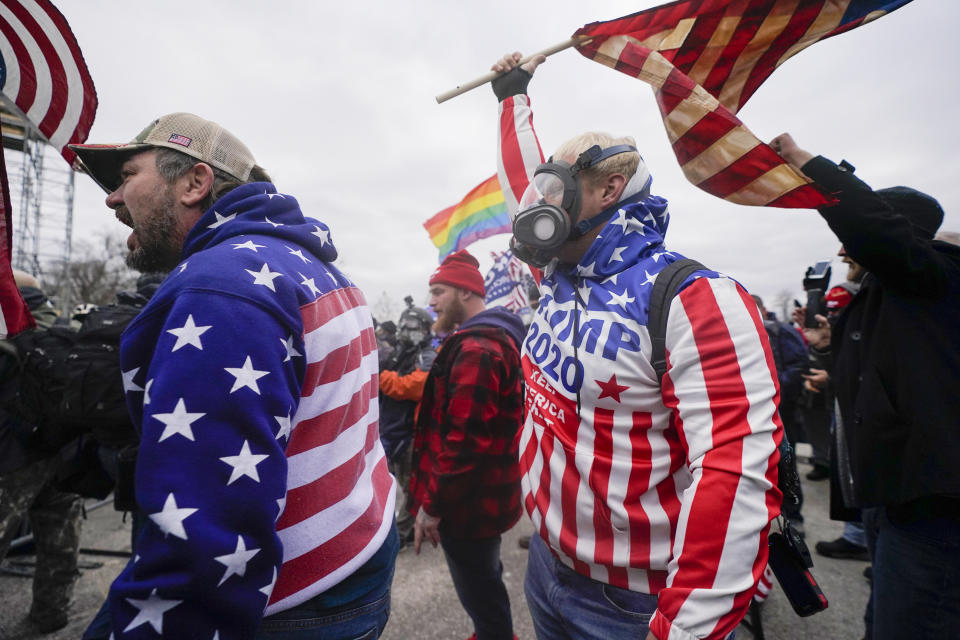 Rioters yell on the West Front of the U.S. Capitol on Jan. 6, 2021, in Washington. (AP Photo/Julio Cortez)