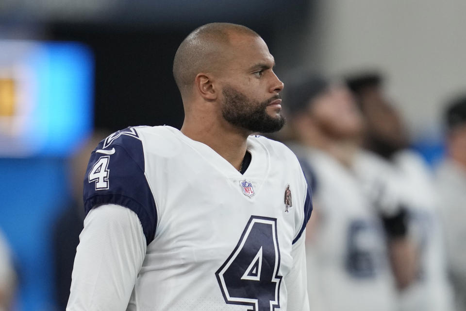 Dallas Cowboys quarterback Dak Prescott (4) looks on from the sideline during the second half of an NFL football game against the Los Angeles Chargers, Monday, Oct. 16, 2023, in Inglewood, Calif. (AP Photo/Ashley Landis)