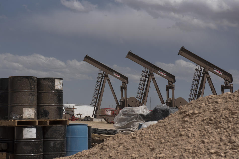 A row of pumpjacks is seen as U.S. Vice President Mike Pence, not pictured, tours a Diamondback Energy Inc. oil rig in Midland, Texas, U.S., on Wednesday, April 17, 2019. Pence gave remarks to employees regarding the impacts of the Administration's United States-Mexico-Canada Agreement. Photographer: Callaghan O'Hare/Bloomberg via Getty Images